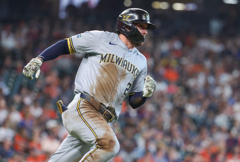 May 19, 2024; Houston, Texas, USA; Milwaukee Brewers second baseman Brice Turang (2) runs to first base on a single during the third inning against the Houston Astros at Minute Maid Park. Mandatory Credit: Troy Taormina-USA TODAY Sports