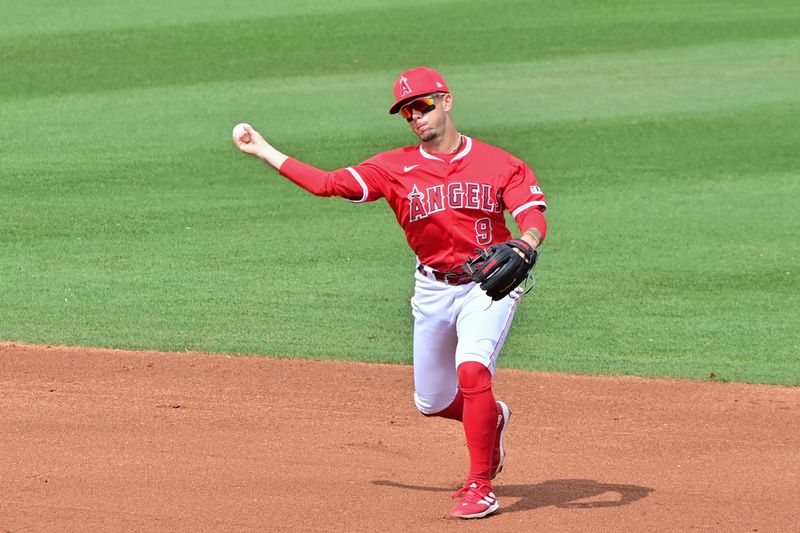 Mar 6, 2024; Tempe, Arizona, USA;  Los Angeles Angels shortstop Zach Neto (9) throws to first base in the second inning against the Oakland Athletics during a spring training game at Tempe Diablo Stadium. Mandatory Credit: Matt Kartozian-USA TODAY Sports