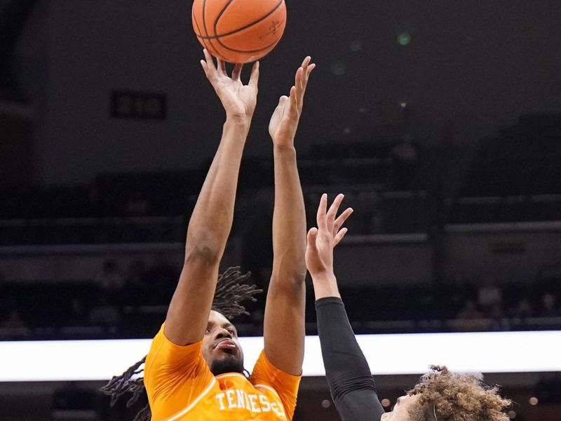 Feb 20, 2024; Columbia, Missouri, USA; Tennessee Volunteers forward Jonas Aidoo (0) shoots over Missouri Tigers forward Noah Carter (35) during the second half at Mizzou Arena. Mandatory Credit: Denny Medley-USA TODAY Sports