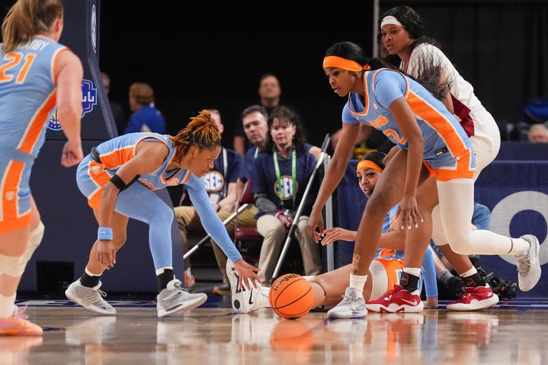 Mar 8, 2024; Greensville, SC, USA; Tennessee Lady Vols players scramble for the loose ball against the Alabama Crimson Tide during the second half at Bon Secours Wellness Arena. Mandatory Credit: Jim Dedmon-USA TODAY Sports