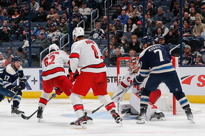 Feb 29, 2024; Columbus, Ohio, USA; Columbus Blue Jackets center Sean Kuraly (7) for the rebound of a Carolina Hurricanes goalie Spencer Martin (41) save during the third period at Nationwide Arena. Mandatory Credit: Russell LaBounty-USA TODAY Sports