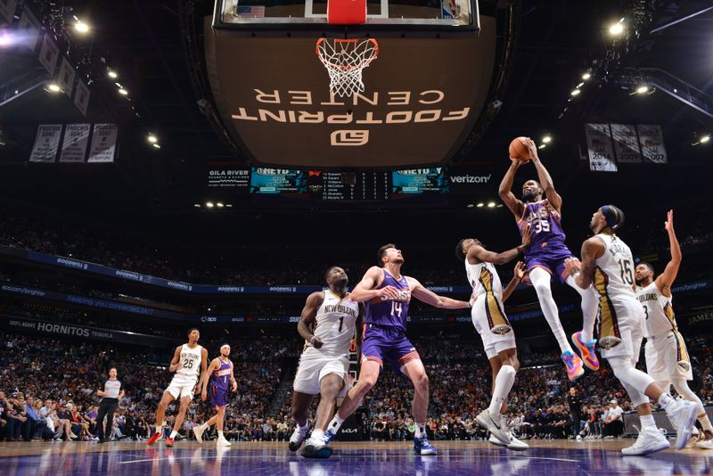 PHOENIX, AZ - APRIL 7: Kevin Durant #35 of the Phoenix Suns shoots the ball during the game against the New Orleans Pelicans on April 7, 2024 at Footprint Center in Phoenix, Arizona. NOTE TO USER: User expressly acknowledges and agrees that, by downloading and or using this photograph, user is consenting to the terms and conditions of the Getty Images License Agreement. Mandatory Copyright Notice: Copyright 2024 NBAE (Photo by Barry Gossage/NBAE via Getty Images)