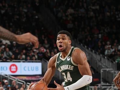 MILWAUKEE, WI - DECEMBER 11:  Giannis Antetokounmpo #34 of the Milwaukee Bucks goes to the basket during the game on December 11, 2023 at the Fiserv Forum Center in Milwaukee, Wisconsin. NOTE TO USER: User expressly acknowledges and agrees that, by downloading and or using this Photograph, user is consenting to the terms and conditions of the Getty Images License Agreement. Mandatory Copyright Notice: Copyright 2023 NBAE (Photo by Gary Dineen/NBAE via Getty Images).