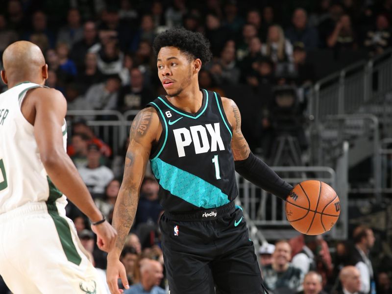 MILWAUKEE, WI - NOVEMBER 21: Anfernee Simons #1 of the Portland Trail Blazers dribbles the ball during the game on November 21, 2022 at the Fiserv Forum Center in Milwaukee, Wisconsin. NOTE TO USER: User expressly acknowledges and agrees that, by downloading and or using this Photograph, user is consenting to the terms and conditions of the Getty Images License Agreement. Mandatory Copyright Notice: Copyright 2022 NBAE (Photo by Gary Dineen/NBAE via Getty Images).