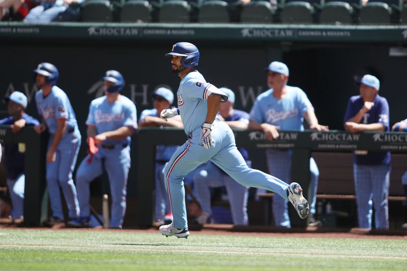 Sep 8, 2024; Arlington, Texas, USA; Texas Rangers second base Marcus Semien (2) rounds the bases after hitting a lead off home run against the Los Angeles Angels in the first inning at Globe Life Field. Mandatory Credit: Tim Heitman-Imagn Images