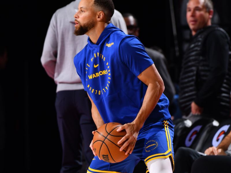 PORTLAND, OR - OCTOBER 23: Stephen Curry #30 of the Golden State Warriors warms up before the game against the Portland Trail Blazers on October 23, 2024 at the Moda Center Arena in Portland, Oregon. NOTE TO USER: User expressly acknowledges and agrees that, by downloading and or using this photograph, user is consenting to the terms and conditions of the Getty Images License Agreement. Mandatory Copyright Notice: Copyright 2024 NBAE (Photo by Barry Gossage/NBAE via Getty Images)