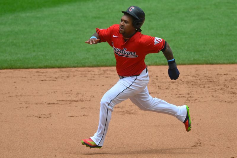 Jun 23, 2024; Cleveland, Ohio, USA; Cleveland Guardians designated hitter Jose Ramirez (11) runs the bases in the first inning against the Toronto Blue Jays at Progressive Field. Mandatory Credit: David Richard-USA TODAY Sports
