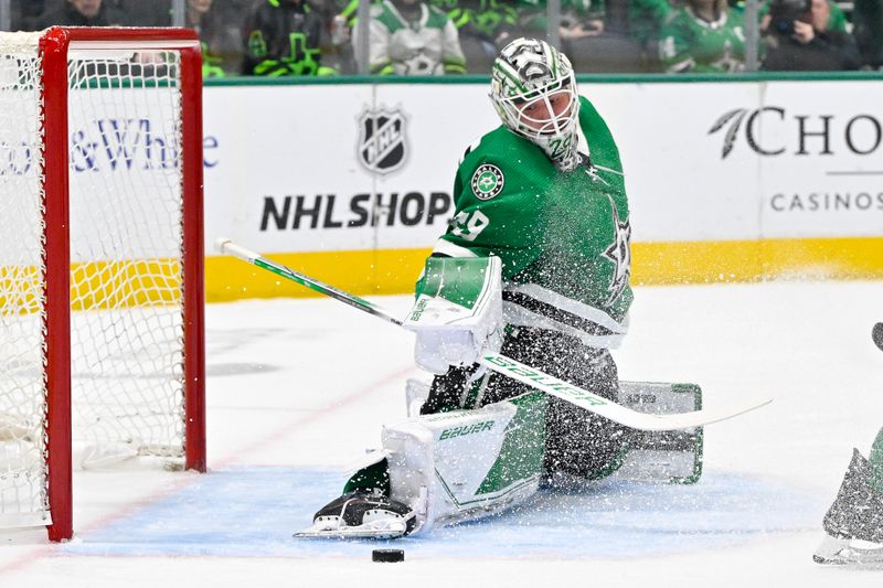 Jan 25, 2024; Dallas, Texas, USA; Dallas Stars goaltender Jake Oettinger (29) makes a save on a Anaheim Ducks shot during the first period at the American Airlines Center. Mandatory Credit: Jerome Miron-USA TODAY Sports