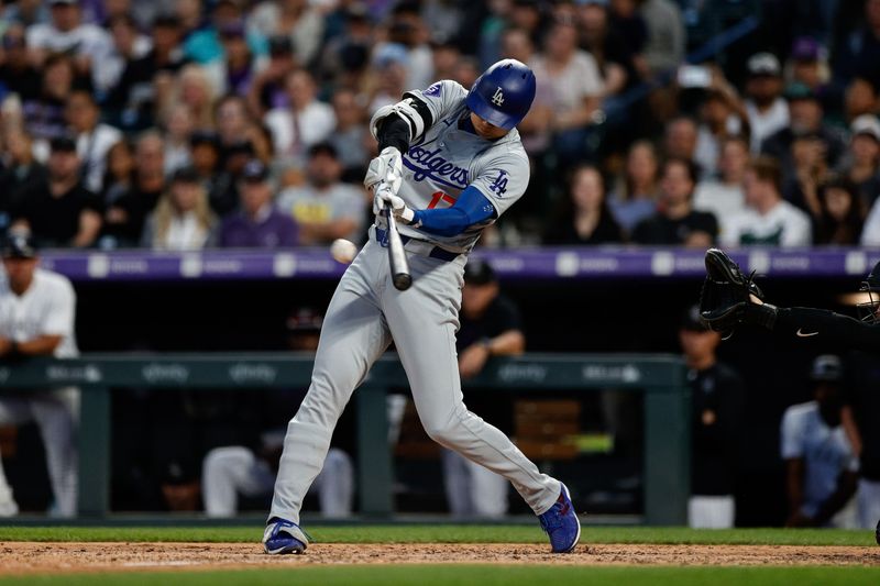 Jun 18, 2024; Denver, Colorado, USA; Los Angeles Dodgers designated hitter Shohei Ohtani (17) at bat in the seventh inning against the Colorado Rockies at Coors Field. Mandatory Credit: Isaiah J. Downing-USA TODAY Sports