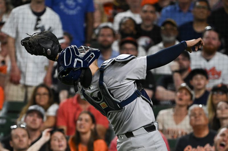 May 1, 2024; Baltimore, Maryland, USA;  New York Yankees catcher Jose Trevino (39) catches a pop fly in the eighth inning against the Baltimore Orioles at Oriole Park at Camden Yards. Mandatory Credit: Tommy Gilligan-USA TODAY Sports