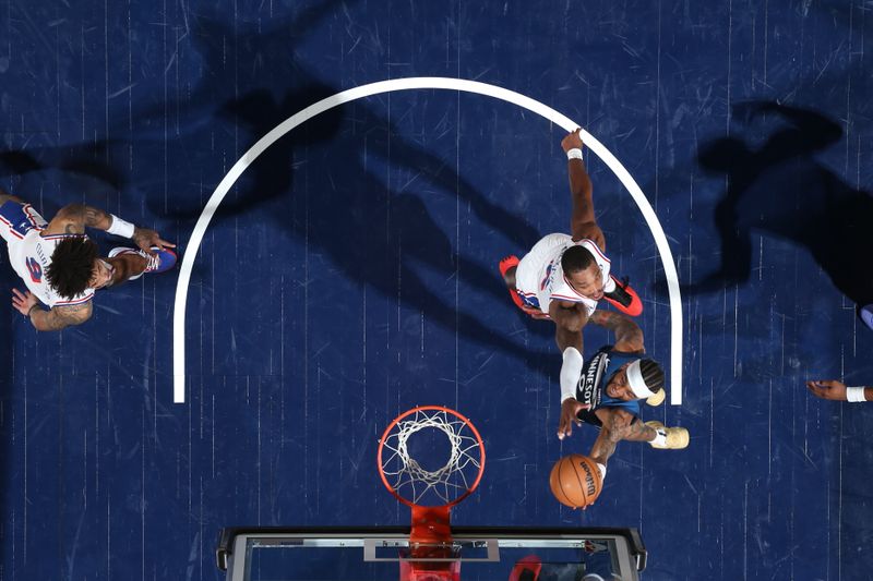 MINNEAPOLIS, MN -  MARCH 4:  Nickeil Alexander-Walker #9 of the Minnesota Timberwolves drives to the basket during the game against the Philadelphia 76ers on March 4, 2025 at Target Center in Minneapolis, Minnesota. NOTE TO USER: User expressly acknowledges and agrees that, by downloading and or using this Photograph, user is consenting to the terms and conditions of the Getty Images License Agreement. Mandatory Copyright Notice: Copyright 2025 NBAE (Photo by David Sherman/NBAE via Getty Images)
