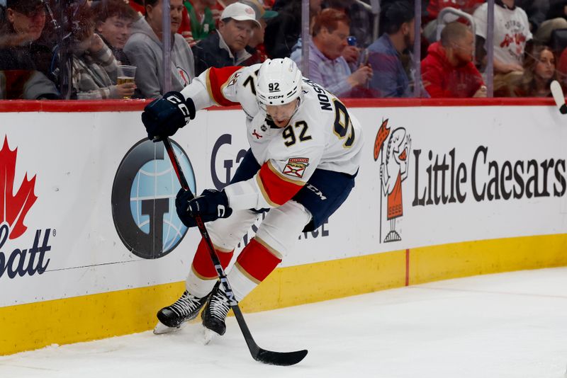Mar 6, 2026; Detroit, Michigan, USA;  Florida Panthers left wing Tomas Nosek (92) skates with the puck in the first period against the Detroit Red Wings at Little Caesars Arena. Mandatory Credit: Rick Osentoski-Imagn Images