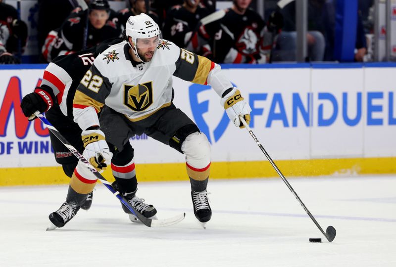 Mar 2, 2024; Buffalo, New York, USA;  Vegas Golden Knights right wing Michael Amadio (22) controls the puck during the first period against the Buffalo Sabres at KeyBank Center. Mandatory Credit: Timothy T. Ludwig-USA TODAY Sports