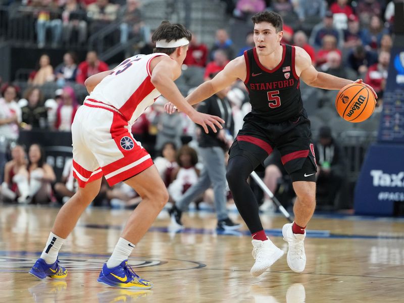 Mar 9, 2023; Las Vegas, NV, USA; Stanford Cardinal guard Michael O'Connell (5) is defended by Arizona Wildcats guard Kerr Kriisa (25) during the first half at T-Mobile Arena. Mandatory Credit: Stephen R. Sylvanie-USA TODAY Sports