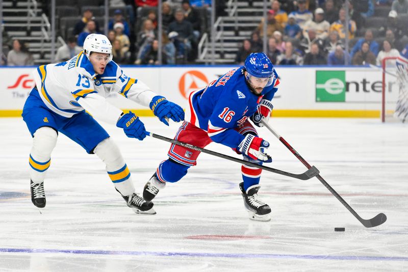 Dec 18, 2025; St. Louis, Missouri, USA; New York Rangers center Vincent Trocheck (16) controls the puck as St. Louis Blues right wing Alexey Toropchenko (13) defends during the first period at Enterprise Center. Mandatory Credit: Jeff Curry-Imagn Images