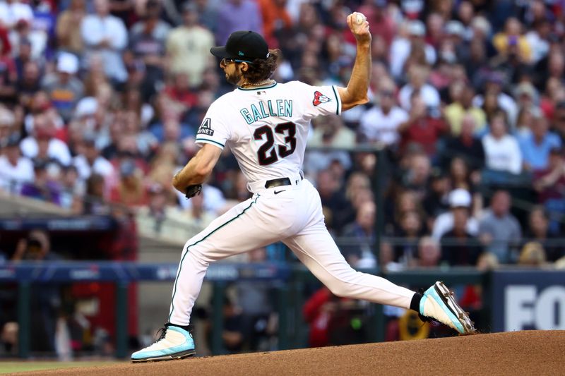 Nov 1, 2023; Phoenix, Arizona, USA; Arizona Diamondbacks starting pitcher Zac Gallen (23) throws a pitch against the Texas Rangers during the first inning in game five of the 2023 World Series at Chase Field. Mandatory Credit: Mark J. Rebilas-USA TODAY Sports