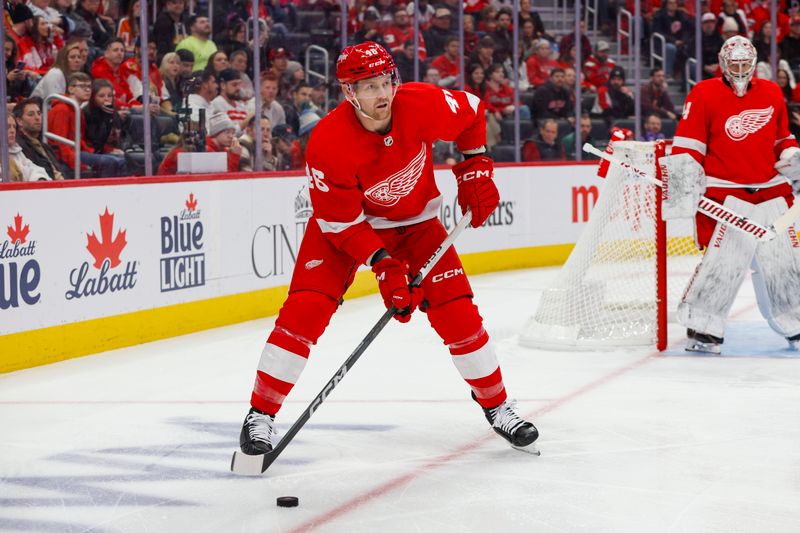 Dec 9, 2023; Detroit, Michigan, USA; Detroit Red Wings defenseman Jeff Petry (46) handles the puck during the first period at Little Caesars Arena. Mandatory Credit: Brian Bradshaw Sevald-USA TODAY Sports