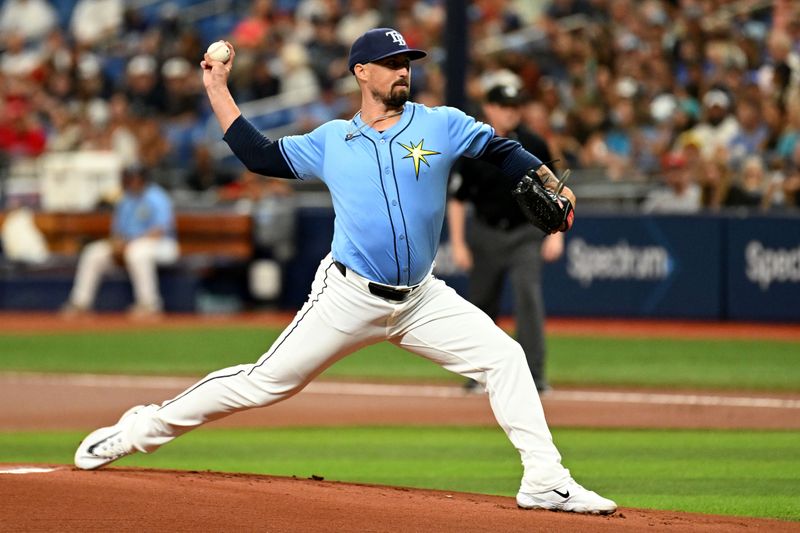 Jul 28, 2024; St. Petersburg, Florida, USA; Tampa Bay Rays starting pitcher Shawn Armstrong (64) throws a pitch in the first inning against the Cincinnati Reds at Tropicana Field. Mandatory Credit: Jonathan Dyer-USA TODAY Sports