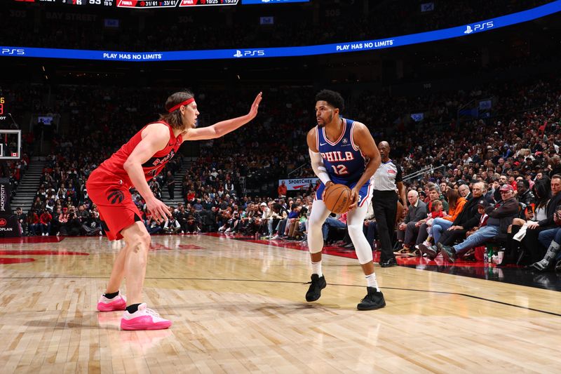 TORONTO, CANADA - MARCH 31: Tobias Harris #12 of the Philadelphia 76ers handles the ball during the game against the Toronto Raptors on March 31, 2024 at the Scotiabank Arena in Toronto, Ontario, Canada.  NOTE TO USER: User expressly acknowledges and agrees that, by downloading and or using this Photograph, user is consenting to the terms and conditions of the Getty Images License Agreement.  Mandatory Copyright Notice: Copyright 2024 NBAE (Photo by Vaughn Ridley/NBAE via Getty Images)