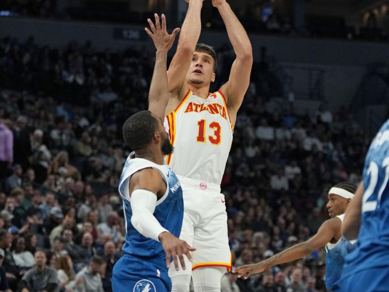 MINNEAPOLIS, MN -  APRIL 12: Bogdan Bogdanovic #13 of the Atlanta Hawks shoots the ball during the game against the Minnesota Timberwolves on April 12, 2024 at Target Center in Minneapolis, Minnesota. NOTE TO USER: User expressly acknowledges and agrees that, by downloading and or using this Photograph, user is consenting to the terms and conditions of the Getty Images License Agreement. Mandatory Copyright Notice: Copyright 2024 NBAE (Photo by Jordan Johnson/NBAE via Getty Images)