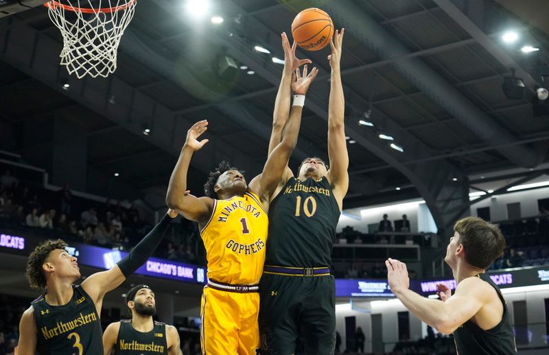 Jan 28, 2023; Evanston, Illinois, USA; Northwestern Wildcats forward Tydus Verhoeven (10) and Minnesota Golden Gophers forward Joshua Ola-Joseph (1) go for a rebound during the first half at Welsh-Ryan Arena. Mandatory Credit: David Banks-USA TODAY Sports