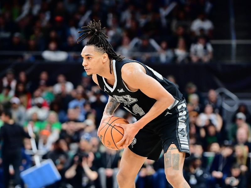 AUSTIN, TX - MARCH 17: Devin Vassell #24 of the San Antonio Spurs handles the ball during the game against the Brooklyn Nets on March 17, 2024 at the Moody Center in Austin, Texas. NOTE TO USER: User expressly acknowledges and agrees that, by downloading and or using this photograph, user is consenting to the terms and conditions of the Getty Images License Agreement. Mandatory Copyright Notice: Copyright 2024 NBAE (Photos by Michael Gonzales/NBAE via Getty Images)