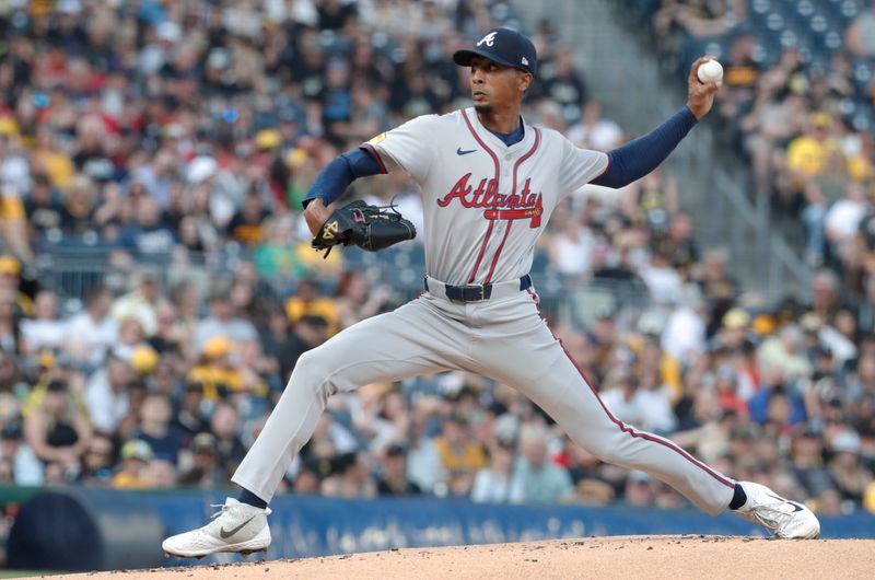 May 24, 2024; Pittsburgh, Pennsylvania, USA;  Atlanta Braves starting pitcher Ray Kerr (58) delivers a pitch against the Pittsburgh Pirates during the first inning at PNC Park. Mandatory Credit: Charles LeClaire-USA TODAY Sports