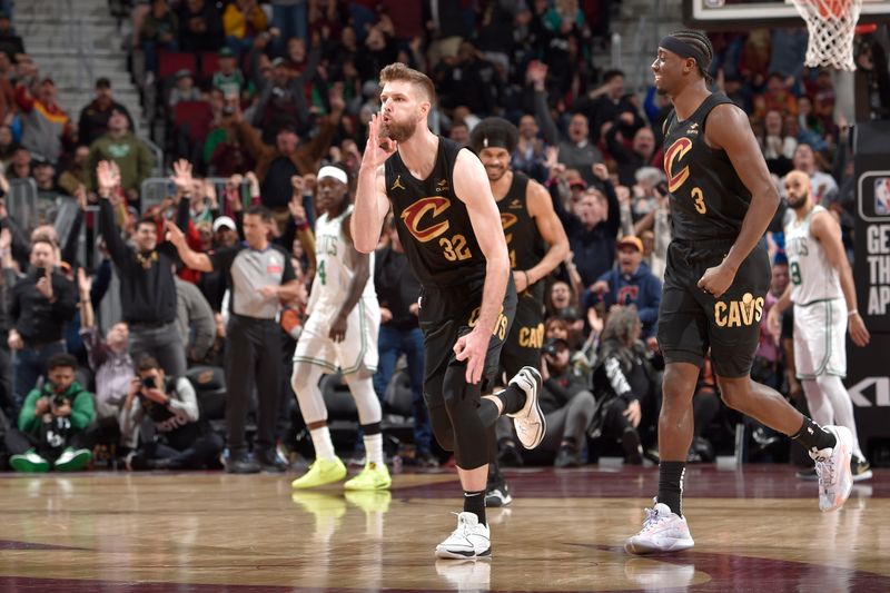 CLEVELAND, OH - MARCH 5: Dean Wade #32 of the Cleveland Cavaliers celebrates during the game against the Boston Celtics on March 5, 2024 at Rocket Mortgage FieldHouse in Cleveland, Ohio. NOTE TO USER: User expressly acknowledges and agrees that, by downloading and/or using this Photograph, user is consenting to the terms and conditions of the Getty Images License Agreement. Mandatory Copyright Notice: Copyright 2024 NBAE (Photo by David Liam Kyle/NBAE via Getty Images)