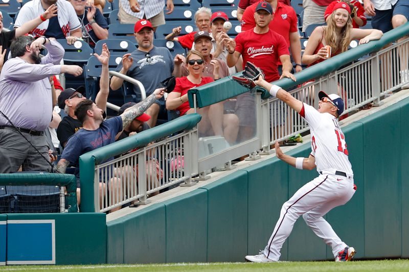 Apr 16, 2023; Washington, District of Columbia, USA; Washington Nationals left fielder Alex Call (17) catches a fly ball hit by Cleveland Guardians right fielder Will Brennan (not pictured) during the ninth inning at Nationals Park. Mandatory Credit: Geoff Burke-USA TODAY Sports