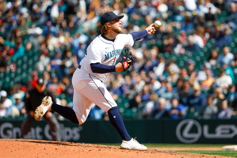 May 30, 2024; Seattle, Washington, USA; Seattle Mariners relief pitcher Kirby Snead (43) throws against the Houston Astros during the ninth inning at T-Mobile Park. Mandatory Credit: Joe Nicholson-USA TODAY Sports