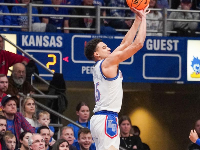 Dec 5, 2023; Lawrence, Kansas, USA;  Kansas Jayhawks guard Kevin McCullar Jr. (15) shoots a three point basket against the UMKC Kangaroos during the first half at Allen Fieldhouse. Mandatory Credit: Denny Medley-USA TODAY Sports