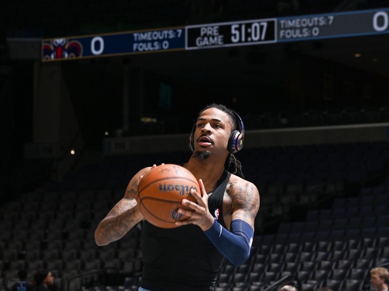 MEMPHIS, TN - NOVEMBER 29: Ja Morant #12 of the Memphis Grizzlies warms up before the game against the New Orleans Pelicans during the Emirates NBA Cup game on November 29, 2024 at FedExForum in Memphis, Tennessee. NOTE TO USER: User expressly acknowledges and agrees that, by downloading and or using this photograph, User is consenting to the terms and conditions of the Getty Images License Agreement. Mandatory Copyright Notice: Copyright 2024 NBAE (Photo by Grant Burke/NBAE via Getty Images)