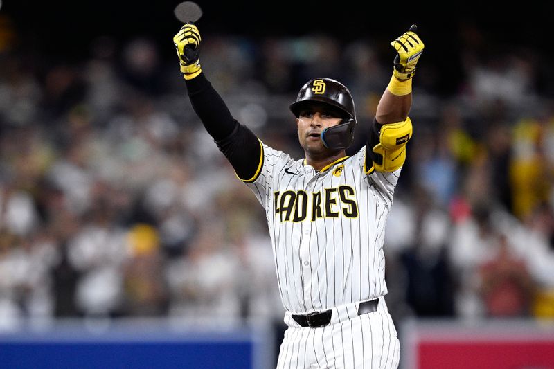 Jul 6, 2024; San Diego, California, USA; San Diego Padres designated hitter Donovan Solano (39) celebrates after hitting a double against the Arizona Diamondbacks during the eighth inning at Petco Park. Mandatory Credit: Orlando Ramirez-USA TODAY Sports