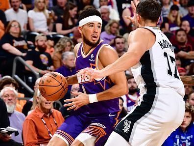 PHOENIX, AZ - NOVEMBER 2: Devin Booker #1 of the Phoenix Suns dribbles the ball during the game against the San Antonio Spurs on November 2, 2023 at Footprint Center in Phoenix, Arizona. NOTE TO USER: User expressly acknowledges and agrees that, by downloading and or using this photograph, user is consenting to the terms and conditions of the Getty Images License Agreement. Mandatory Copyright Notice: Copyright 2023 NBAE (Photo by Barry Gossage/NBAE via Getty Images)