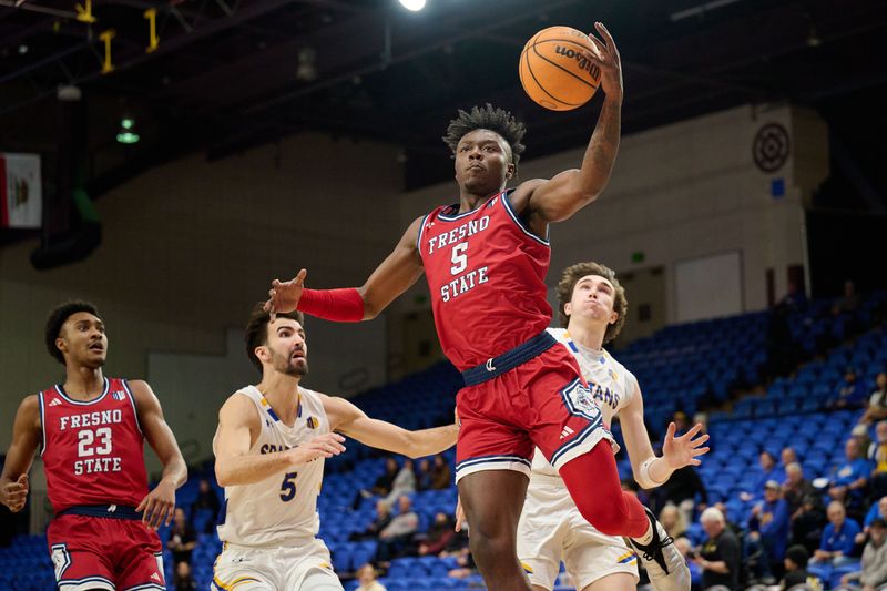 Feb 6, 2024; San Jose, California, USA; Fresno State Bulldogs guard Jalen Weaver (5) rebounds the ball against San Jose State Spartans forward Tibet Gorener (5) during the first half at Provident Credit Union Event Center. Mandatory Credit: Robert Edwards-USA TODAY Sports