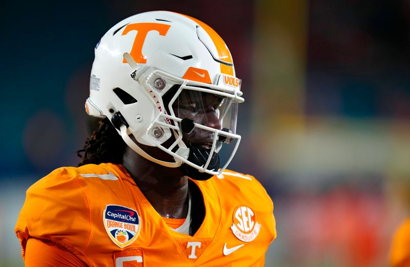 Dec 30, 2022; Miami Gardens, FL, USA; Tennessee Volunteers quarterback Joe Milton III (7) looks on before the 2022 Orange Bowl against the Clemson Tigers at Hard Rock Stadium. Mandatory Credit: Rich Storry-USA TODAY Sports