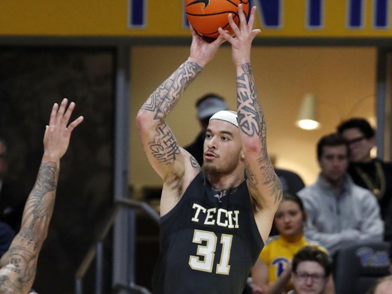 Feb 25, 2025; Pittsburgh, Pennsylvania, USA; Georgia Tech Yellow Jackets forward Duncan Powell (31) shoots against the Pittsburgh Panthers during the second half at the Petersen Events Center. Mandatory Credit: Charles LeClaire-Imagn Images