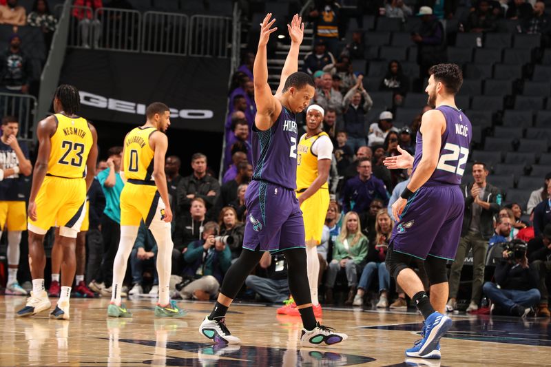 CHARLOTTE, NC - February 12: Grant Williams #2 of the Charlotte Hornets reacts during the game against the Indiana Pacers on February 12, 2024 at Spectrum Center in Charlotte, North Carolina. NOTE TO USER: User expressly acknowledges and agrees that, by downloading and or using this photograph, User is consenting to the terms and conditions of the Getty Images License Agreement. Mandatory Copyright Notice: Copyright 2024 NBAE (Photo by Kent Smith/NBAE via Getty Images)