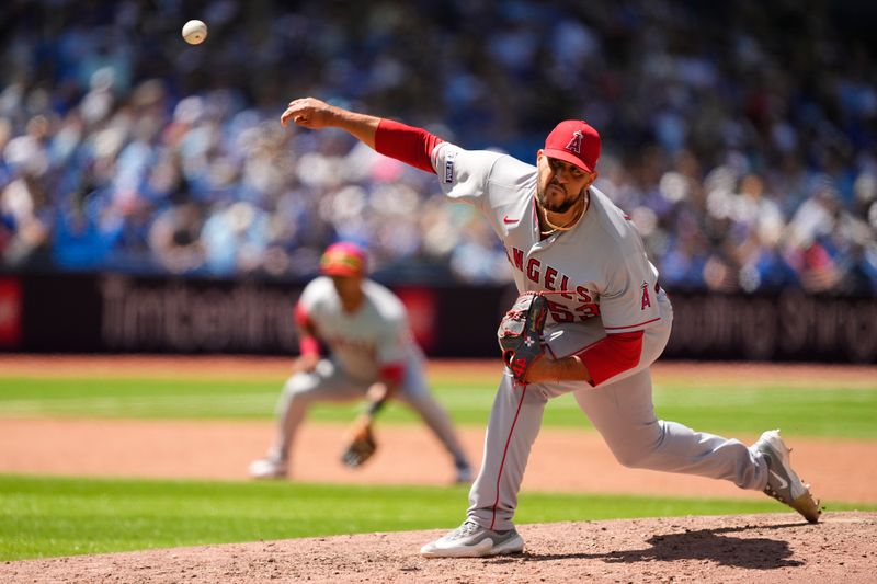 Jul 30, 2023; Toronto, Ontario, CAN; Los Angeles Angels pitcher Carlos Estevez (53) pitches to the Toronto Blue Jays during the ninth inning at Rogers Centre. Mandatory Credit: John E. Sokolowski-USA TODAY Sports