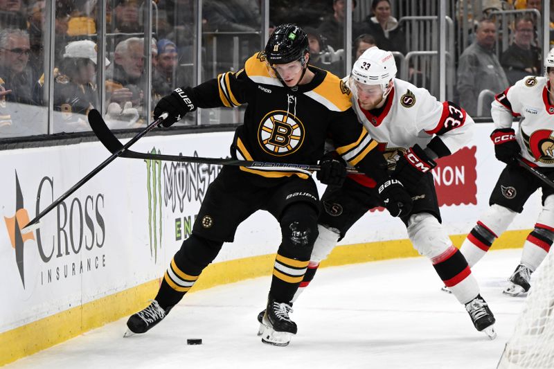 Jan 23, 2025; Boston, Massachusetts, USA; Ottawa Senators defenseman Nikolas Matinpalo (33) and Boston Bruins center Trent Frederic (11) battle for the puck during the third period at the TD Garden. Mandatory Credit: Brian Fluharty-Imagn Images