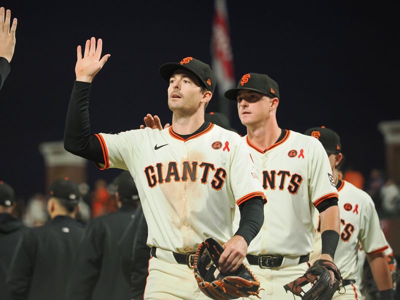 Jul 31, 2024; San Francisco, California, USA; San Francisco Giants right fielder Mike Yastrzemski (5) high fives teammates after the game against the Oakland Athletics at Oracle Park. Mandatory Credit: Kelley L Cox-USA TODAY Sports