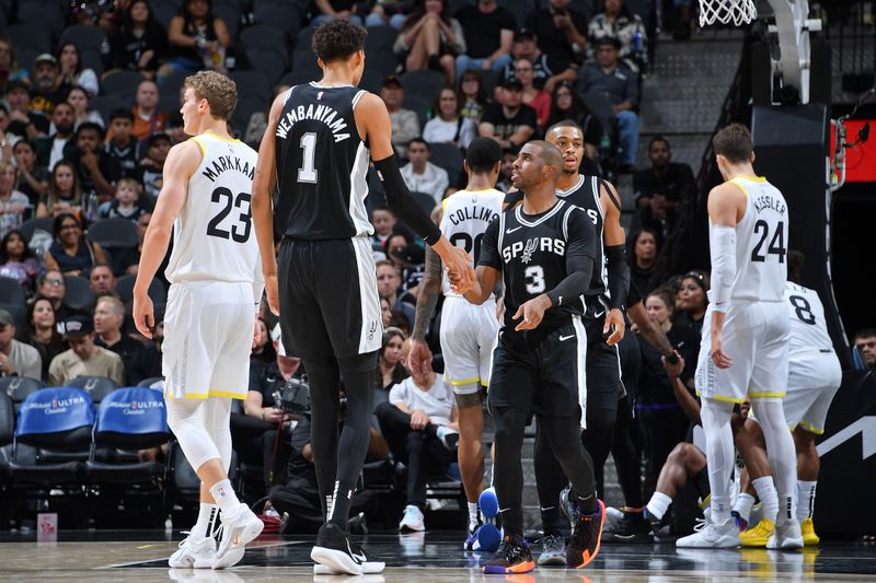 SAN ANTONIO, TX - NOVEMBER 9: Victor Wembanyama #1 and Chris Paul #3 of the San Antonio Spurs high five during the game against the Utah Jazz on November 9, 2024 at the Frost Bank Center in San Antonio, Texas. NOTE TO USER: User expressly acknowledges and agrees that, by downloading and or using this photograph, user is consenting to the terms and conditions of the Getty Images License Agreement. Mandatory Copyright Notice: Copyright 2024 NBAE (Photos by Michael Gonzales/NBAE via Getty Images)