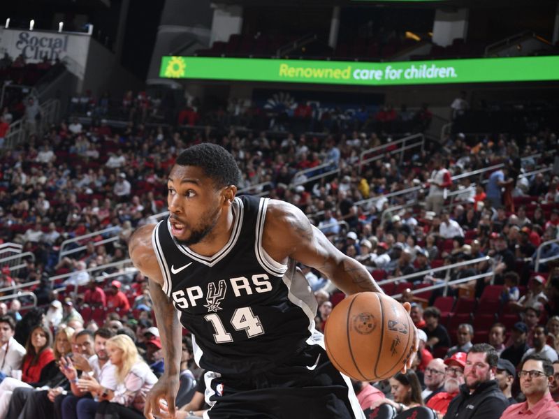 HOUSTON, TX - NOVEMBER 6: Blake Wesley #14 of the San Antonio Spurs dribbles the ball during the game against the Houston Rockets  on November 6, 2024 at the Toyota Center in Houston, Texas. NOTE TO USER: User expressly acknowledges and agrees that, by downloading and or using this photograph, User is consenting to the terms and conditions of the Getty Images License Agreement. Mandatory Copyright Notice: Copyright 2024 NBAE (Photo by Logan Riely/NBAE via Getty Images)