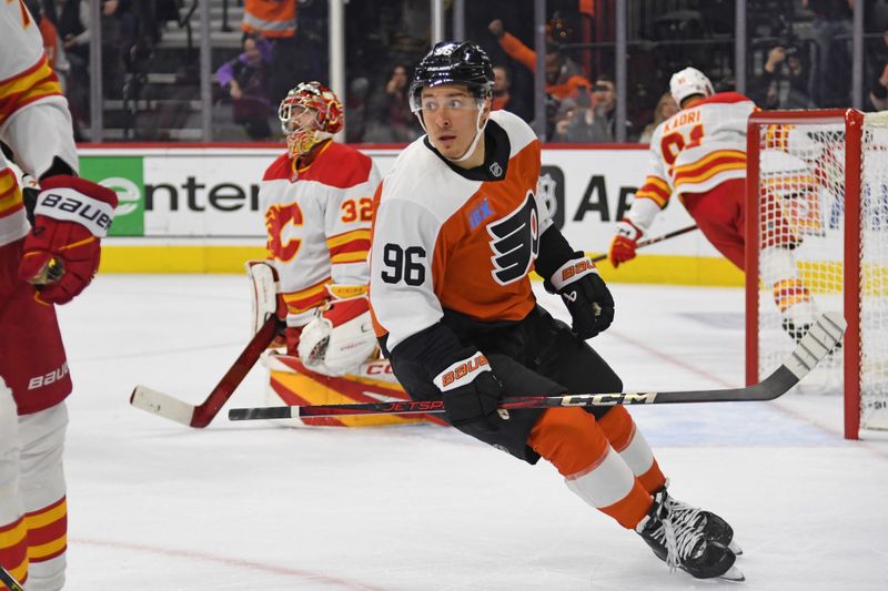 Mar 4, 2025; Philadelphia, Pennsylvania, USA; Philadelphia Flyers left wing Andrei Kuzmenko (96) celebrates his goal against Calgary Flames goaltender Dustin Wolf (32) during the first period at Wells Fargo Center. Mandatory Credit: Eric Hartline-Imagn Images
