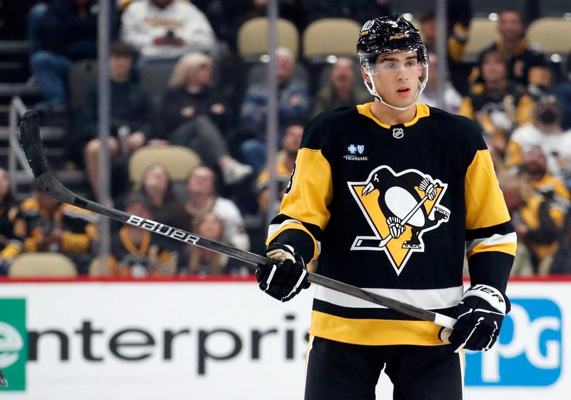 Oct 18, 2024; Pittsburgh, Pennsylvania, USA;  Pittsburgh Penguins defenseman Jack St. Ivany (3) looks on before a face-off against the Carolina Hurricanes during the third period at PPG Paints Arena. Mandatory Credit: Charles LeClaire-Imagn Images