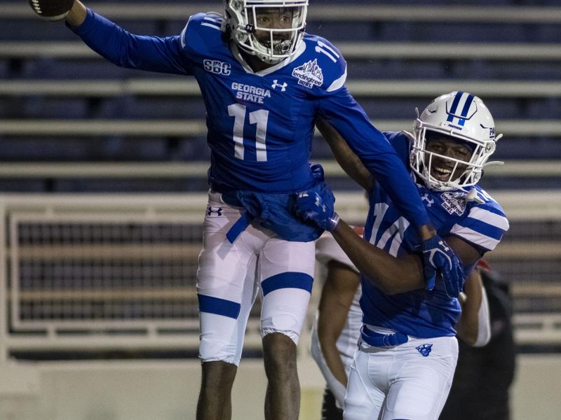 Dec 26, 2020; Mobile, AL, USA; Georgia State Panthers wide receiver Cadarrius Thompson (11) celebrates his touchdown reception with Georgia State Panthers wide receiver Robert Lewis (14) during the second half against the Western Kentucky Hilltoppers at Ladd-Peebles Stadium. Mandatory Credit: Vasha Hunt-USA TODAY Sports