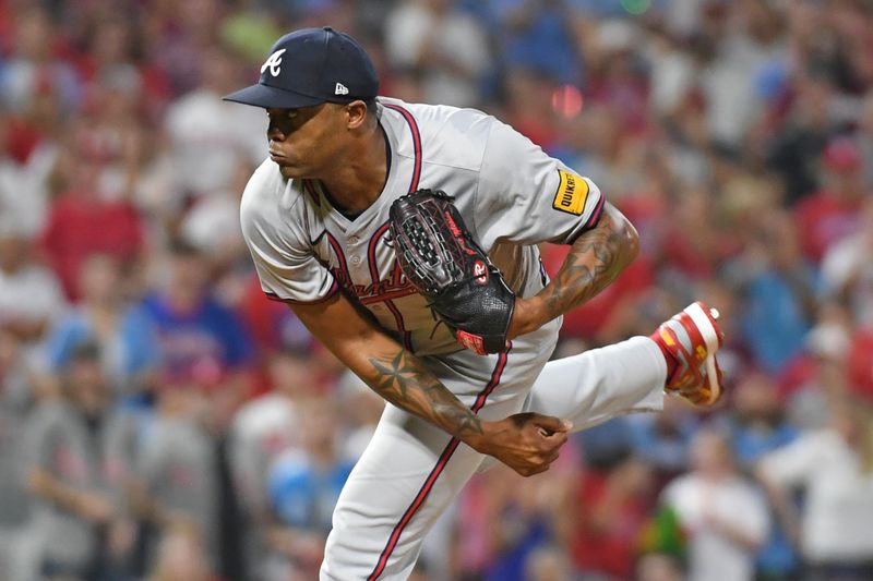 Sep 1, 2024; Philadelphia, Pennsylvania, USA; Atlanta Braves pitcher Raisel Iglesias (26) throws a pitch during the ninth inning against the Philadelphia Phillies at Citizens Bank Park. Mandatory Credit: Eric Hartline-USA TODAY Sports