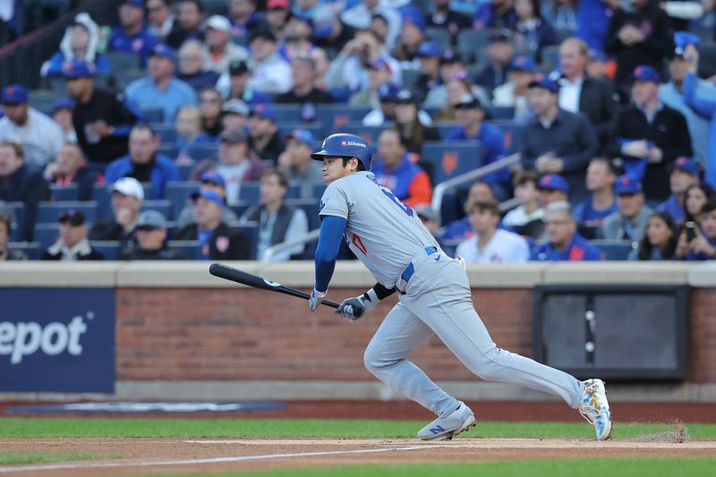 Oct 18, 2024; New York City, New York, USA; Los Angeles Dodgers two-way player Shohei Ohtani (17) hits a single in the first inning against the New York Mets during game five of the NLCS for the 2024 MLB playoffs at Citi Field. Mandatory Credit: Brad Penner-Imagn Images