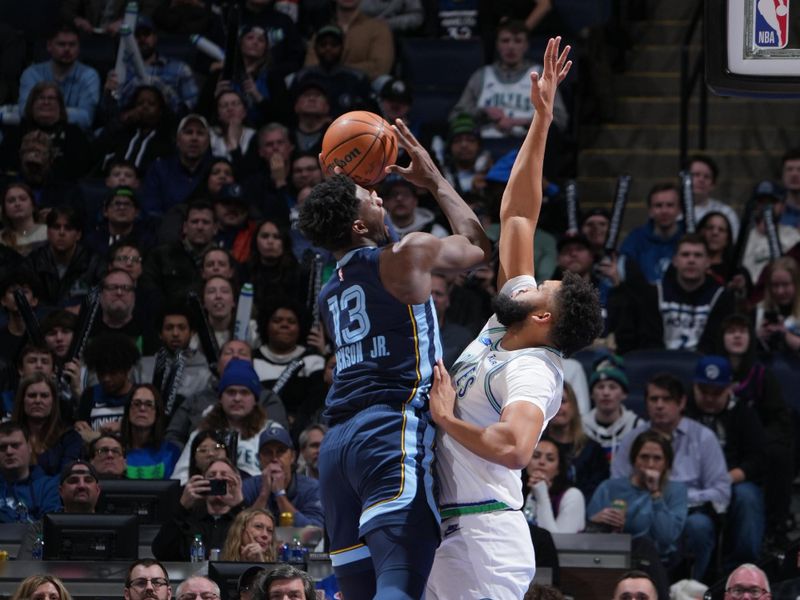 MINNEAPOLIS, MN -  JANUARY 18: Jaren Jackson Jr. #13 of the Memphis Grizzlies shoots the ball over defender Rudy Gobert #27 of the Minnesota Timberwolves during the game on January 18, 2024 at Target Center in Minneapolis, Minnesota. NOTE TO USER: User expressly acknowledges and agrees that, by downloading and or using this Photograph, user is consenting to the terms and conditions of the Getty Images License Agreement. Mandatory Copyright Notice: Copyright 2024 NBAE (Photo by Jordan Johnson/NBAE via Getty Images)