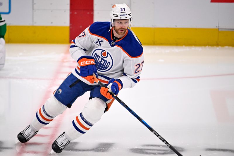 May 21, 2025; Dallas, Texas, USA; Edmonton Oilers defenseman Brett Kulak (27) practices before game one of the Western Conference Final of the 2025 Stanley Cup Playoffs at American Airlines Center. Mandatory Credit: Jerome Miron-Imagn Images